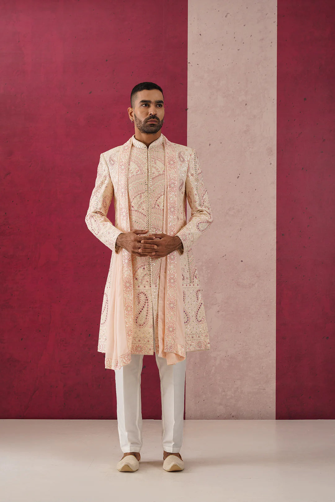 Arjun Peach Sherwani Ensemble with Intricate Mirror Work