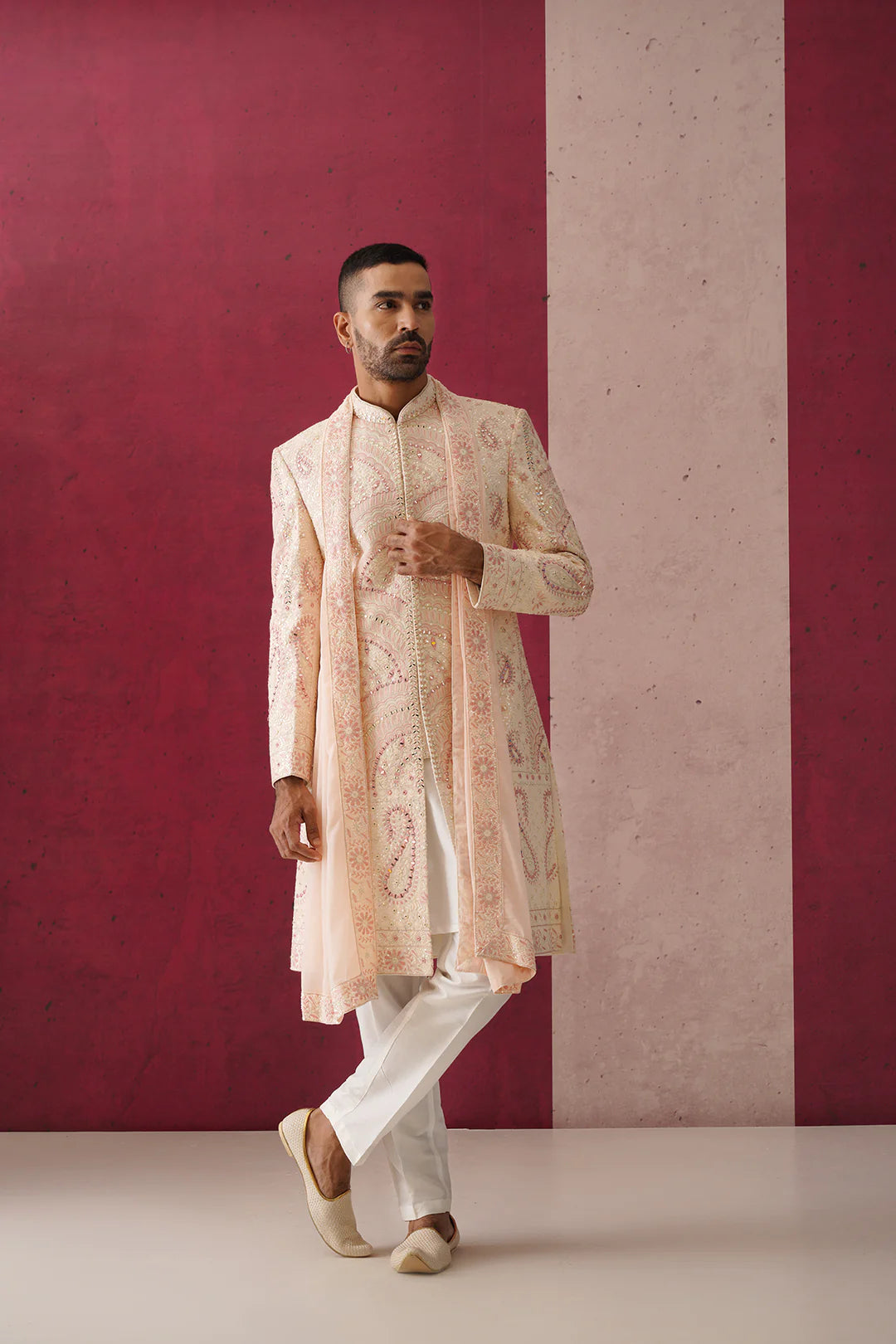 Arjun Peach Sherwani Ensemble with Intricate Mirror Work