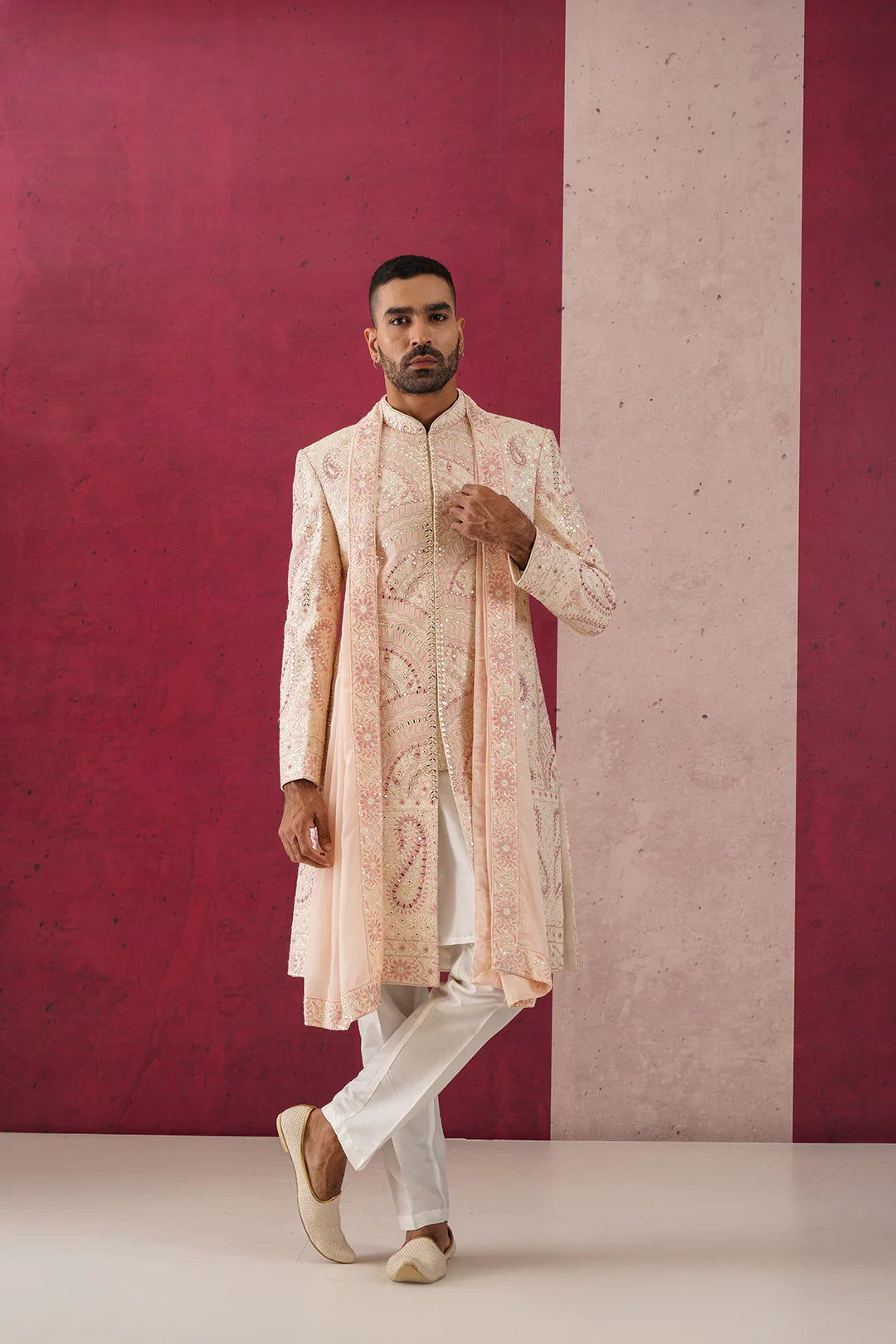 Arjun Peach Sherwani Ensemble with Intricate Mirror Work