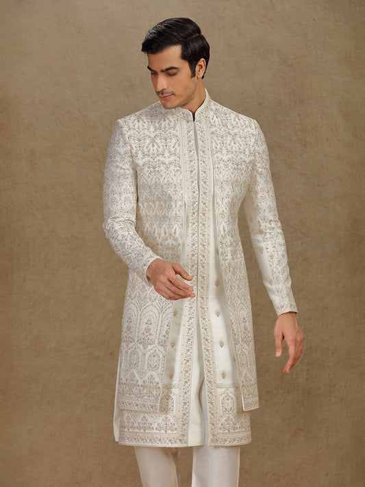 Regal cream silk sherwani with embroidery accents